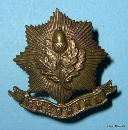 Scarce Cheshire Regiment Brass Badge - Star with Scroll - possibly as worn on side hat, c1920
