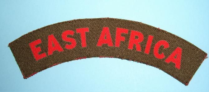 WW2 Printed East Africa Red on Khaki Cloth Shoulder Title