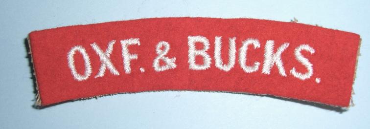 WW2 Oxf. & Bucks (Oxfordshire & Buckinghamshire Light Infantry )  Woven White on Red Felt Cloth Shoulder Title
