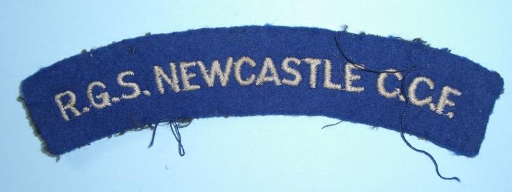 R.G.S. Newcastle C.C.F. Woven White on Blue Cloth Shoulder Title