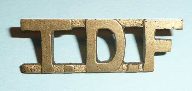 WW2 East Africa  - TDF Tanganyika Defence Force Cast Brass Shoulder Title