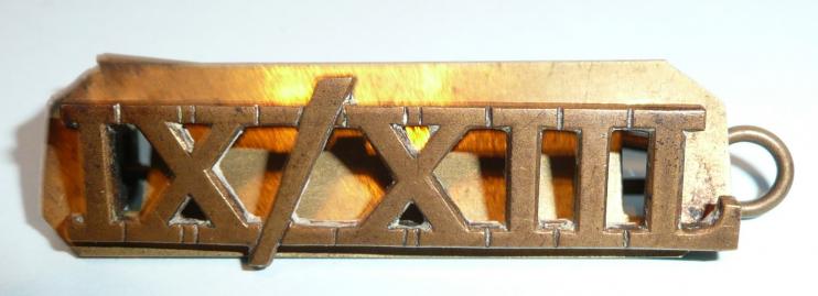 IX/XIIL 9th / 12th Queens Royal Lancers Brass Shoulder Title with Backing Plate
