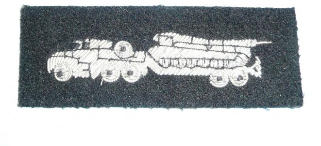 British Army RLC Proficiency Tank Transporter Driver Class 1 Silver Bullion on Cloth Arm badge