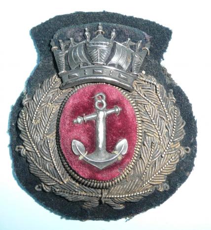 An early Mercantile Marine Merchant Navy Officers Gold Bullion Cap Badge with Silver Plated Crown and Anchor Cap Badge - Makers label 'Lawton & Fenner' Ltd