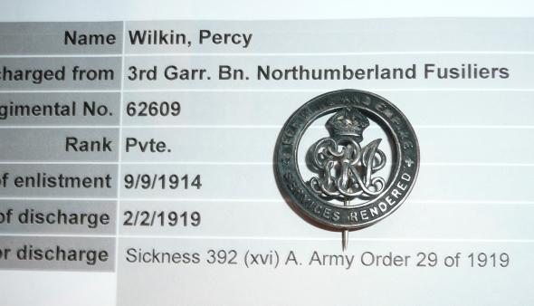 WW1 Silver War Badge (SWB) to Percy Wilkin, Royal Welsh Fusiliers (RWF) and 3rd Garrison Battalion, Northumberland Fusiliers