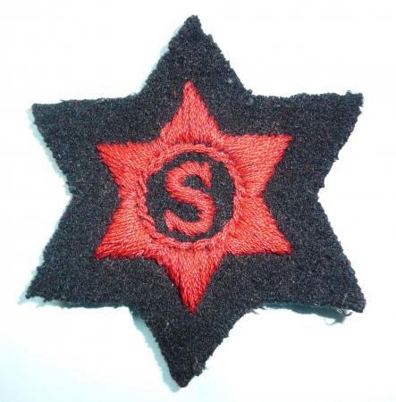 Royal Navy (RN) Supply Rating (Stores) Embroidered Red on Dark Blue Cloth Proficiency Arm Badge