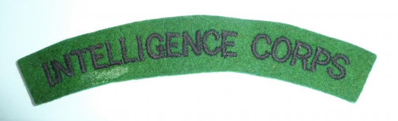 Intelligence Corps Embroidered Black on Green Felt Cloth Shoulder Title