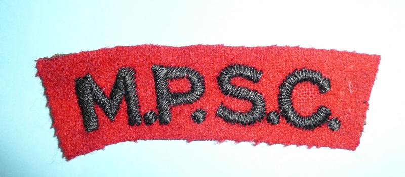 WW2 MPSC Military Provost Staff Corps Embroidered Black on Red Felt Cloth Shoulder Title