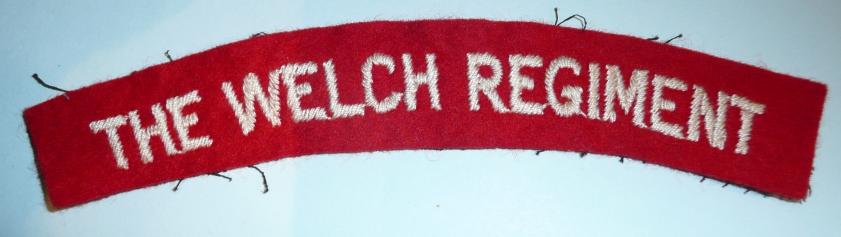 The Welch Regiment Embroidered White on Red Cloth Felt Shoulder Title