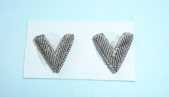 A small pair of silver bullion thread volunteer force officers V shoulder badges