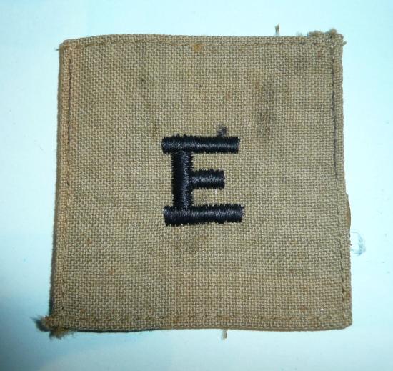 WW2 Middle East / East African Theatre - E (English Speaker) Dark Blue Embroidered E on Khaki Drill Cloth Panel Proficiency / Trade Badge