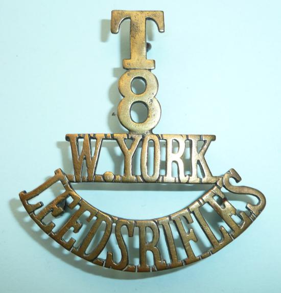 T / 8 / West York / Leeds Rifles One Piece Brass Shoulder Title