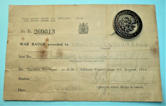 WW1 Silver War Badge (Wound Badge) with attributed Issue Voucher - Kennedy Royal Warwickshire Regiment