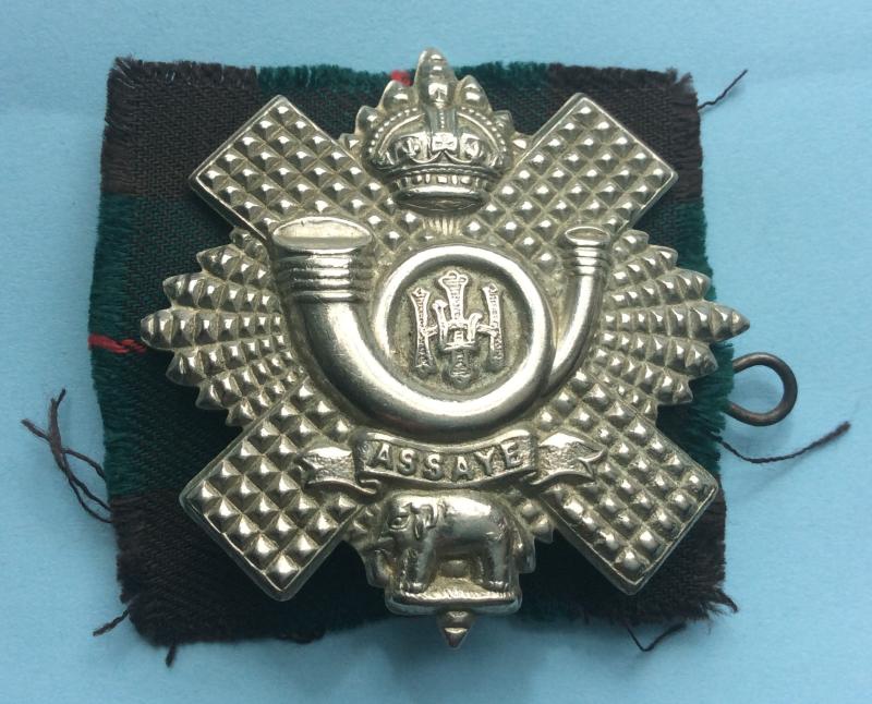 Highland Light Infantry (HLI) Other Ranks White Metal Cap Badge with Backing Cloth
