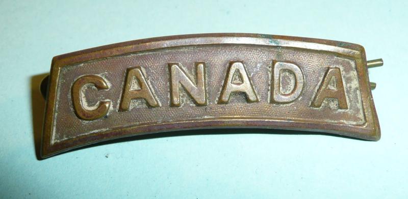 WW1 Canada - Bronze Shoulder Title - Maker named Caron Bros, Montreal 1915