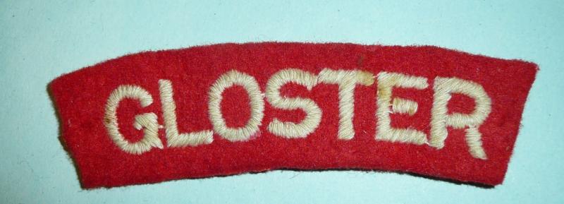 WW2 'Gloster' Gloucestershire Regiment Embroidered White on Red Felt Cloth Shoulder Title