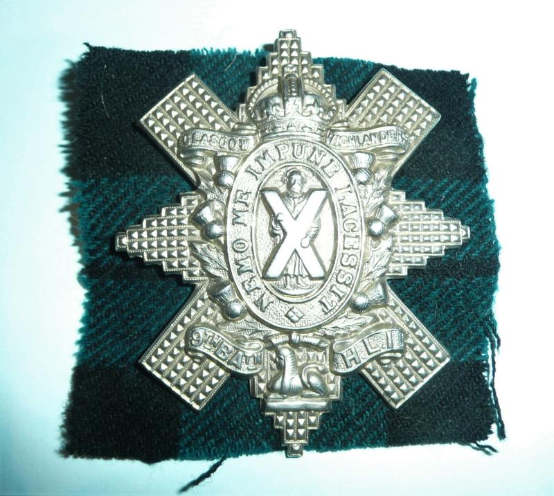 9th Battalion (Glasgow Highlanders) Highland Light Infantry (HLI) White Metal Glengarry Badge with Tartan Cloth Badge Backing
