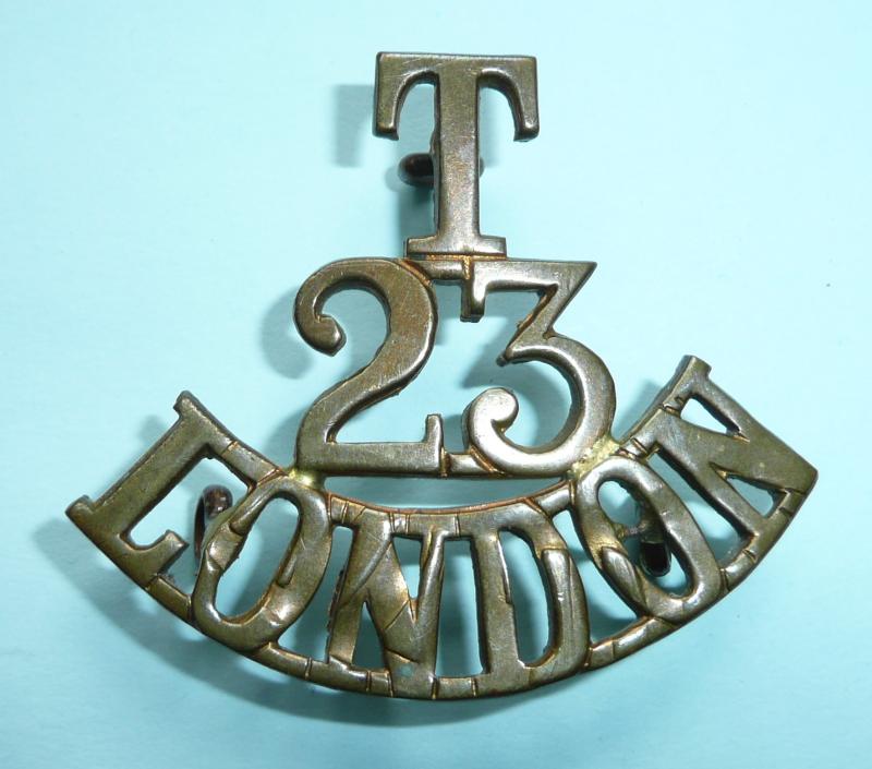 T / 23 / London -  23rd County of London Regiment One Piece Brass Shoulder Title - unusual finish