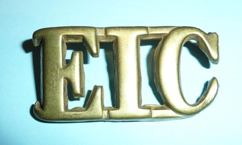 EIC large letters in Brass, unidentified