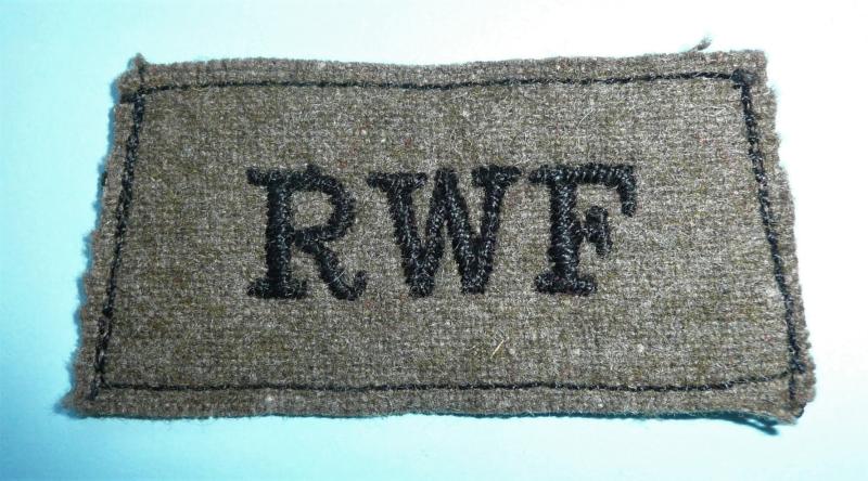 WW2 RWF Royal Welch Fusiliers Woven Black on Khaki Slip-on Slide Shoulder Title