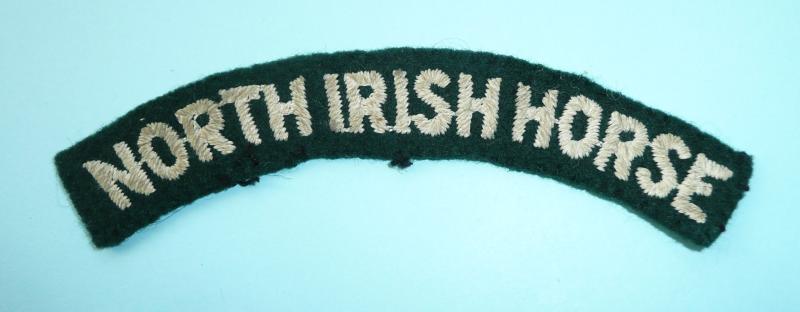 WW2 North Irish Horse (NIH) Embroidered White on Green Felt Cloth Shoulder Title