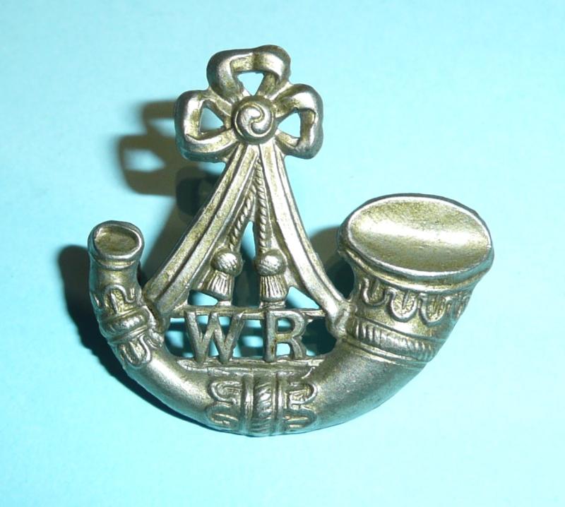 South African Witwatersrand Rifles single white metal collar badge
