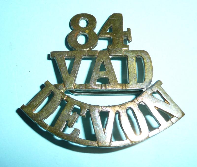 WW1 84 / VAD / DEVON Volunteer Aid Detachment One piece Brass Shoulder Title