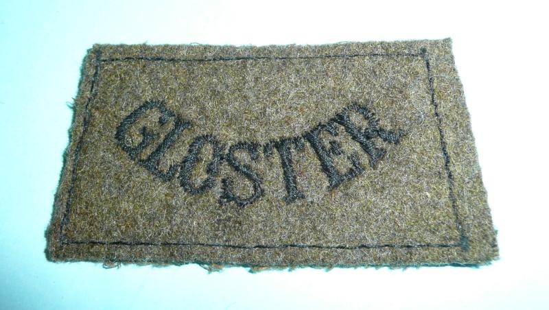 WW2 'Gloster' Gloucestershire Regiment Woven Black on Khaki Slip On Slide Shoulder Title