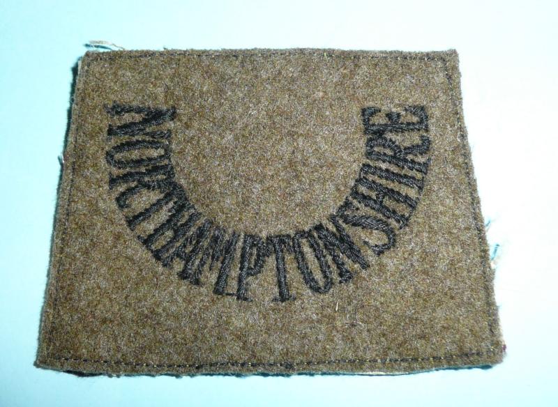 WW2 Northamptonshire Regiment Black on Khaki Slide Slip-On Shoulder Title