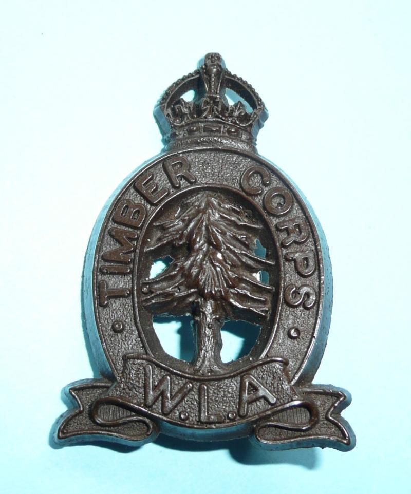 COPY /  Reproduction of a WW2 Chocolate Brown Plastic Economy Pattern Womens Land Army (WLA) Timber Corps Cap Badge