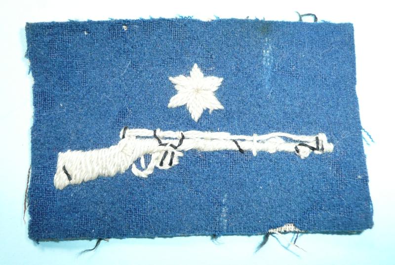 White on Blue Embroided Cloth Rifle Proficiency Marksman Sleeve Arm Badge