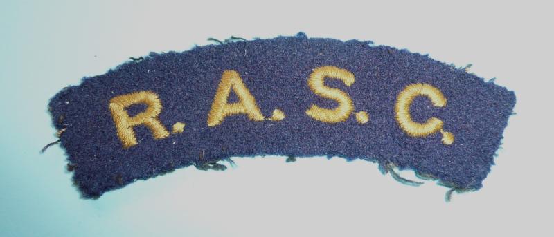 RASC (Royal Army Service Corps) Embroidered Yellow on Dark Blue Felt Cloth Shoulder Title